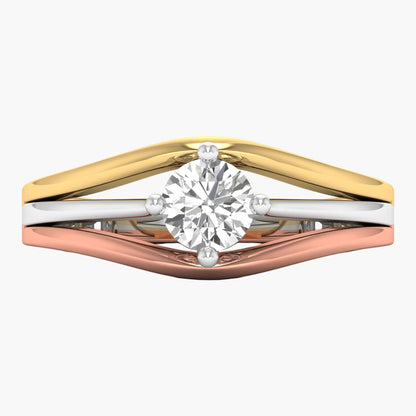 Three-tone gold ring with a diamond on a white background