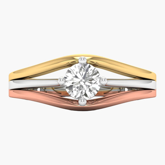 Three-tone gold ring with a diamond on a white background