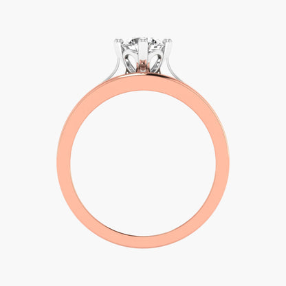 Rose gold ring with a diamond on a white background