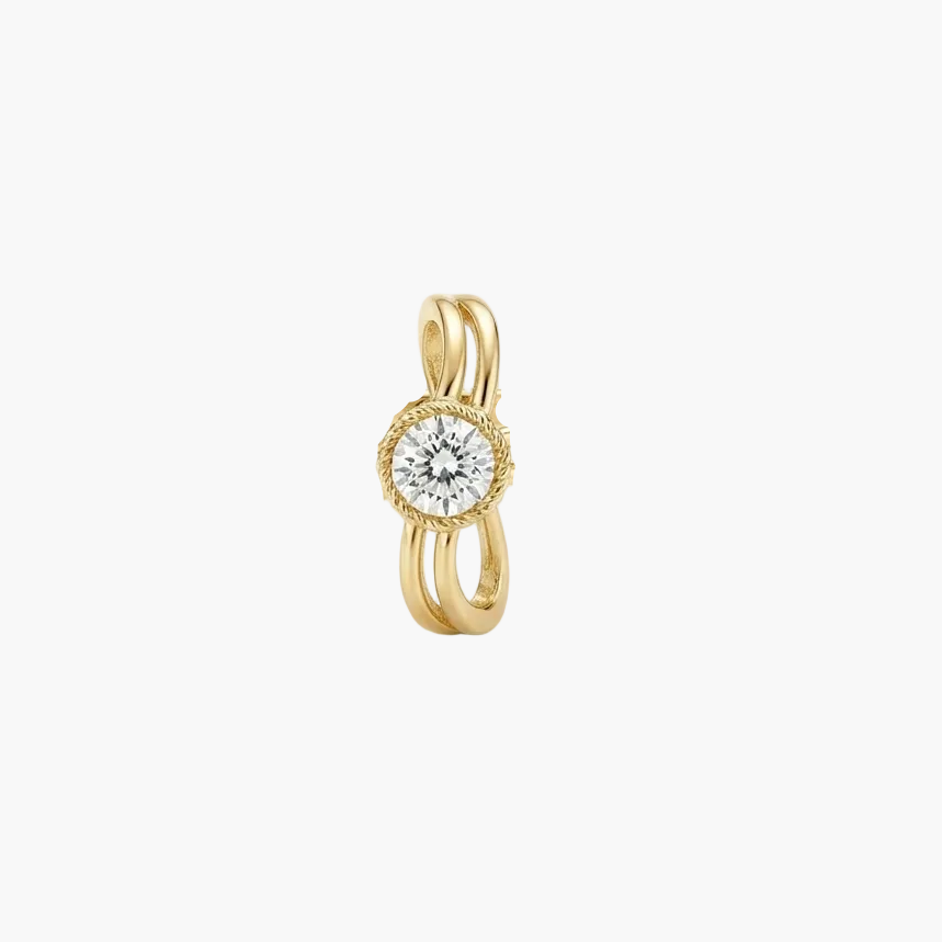 A gold ring featuring a central round-cut diamond surrounded by a delicate halo, with three curved bands wrapping around it, set against a clean white background.