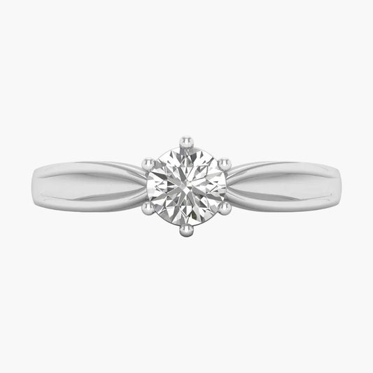 Silver bracelet with heart and circle charms on a white background