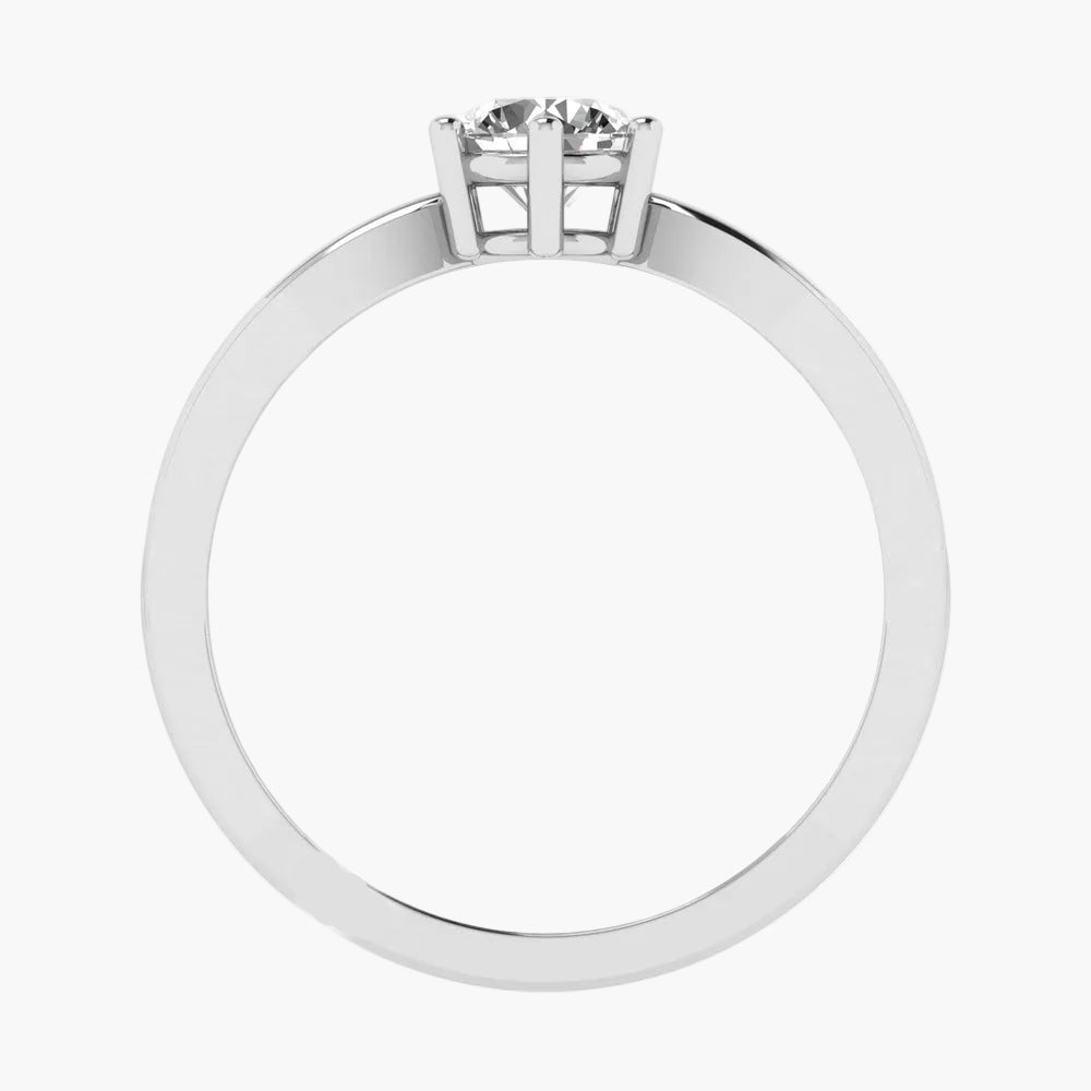 Silver ring with a diamond on a white background