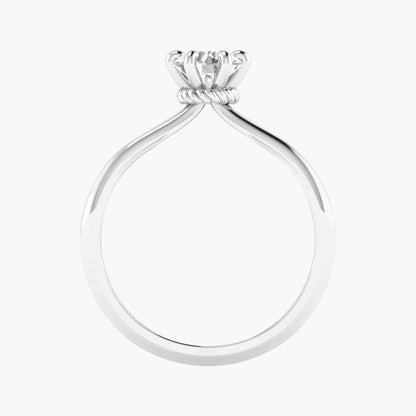 Silver ring with a diamond on a white background
