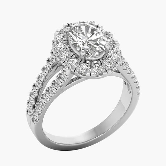 Diamond ring with a halo and shoulder stones on a white background