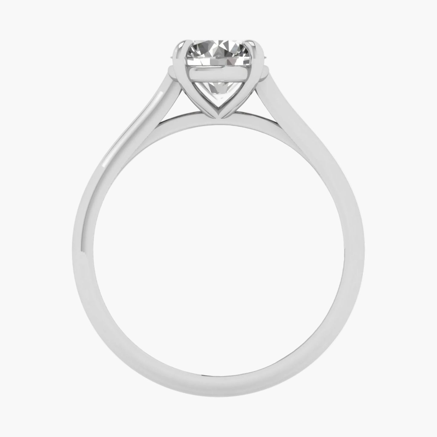 Silver ring with a heart-shaped diamond on a white background