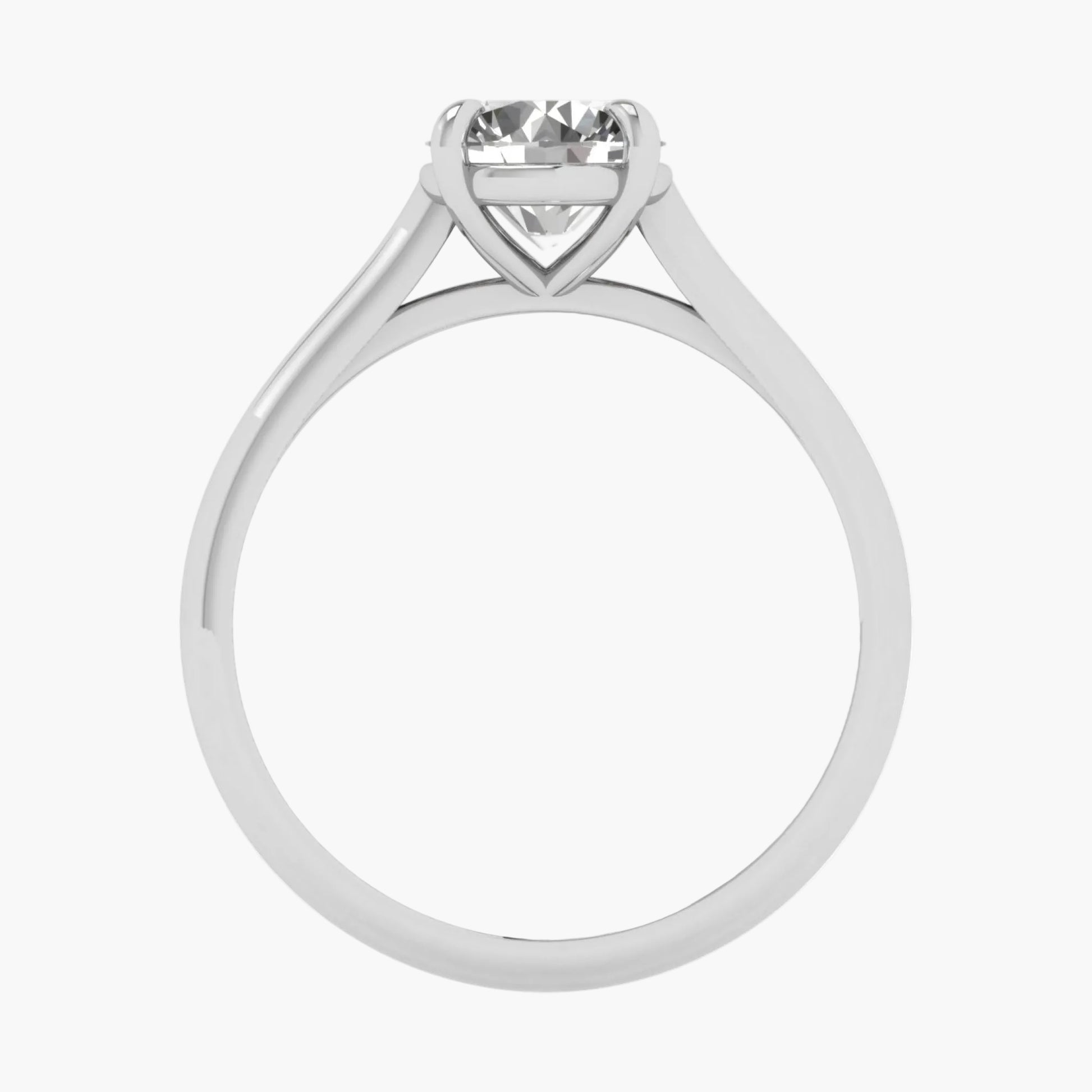 Silver ring with a heart-shaped diamond on a white background