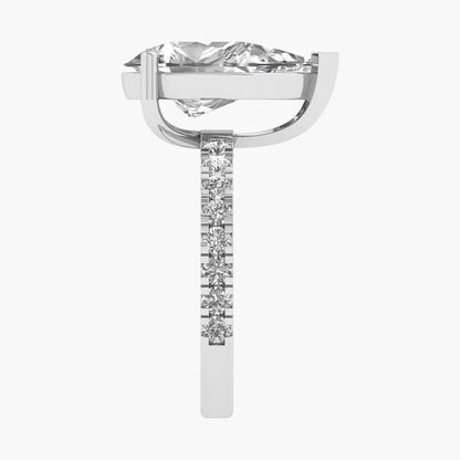 Diamond ring with a white gold band on a white background