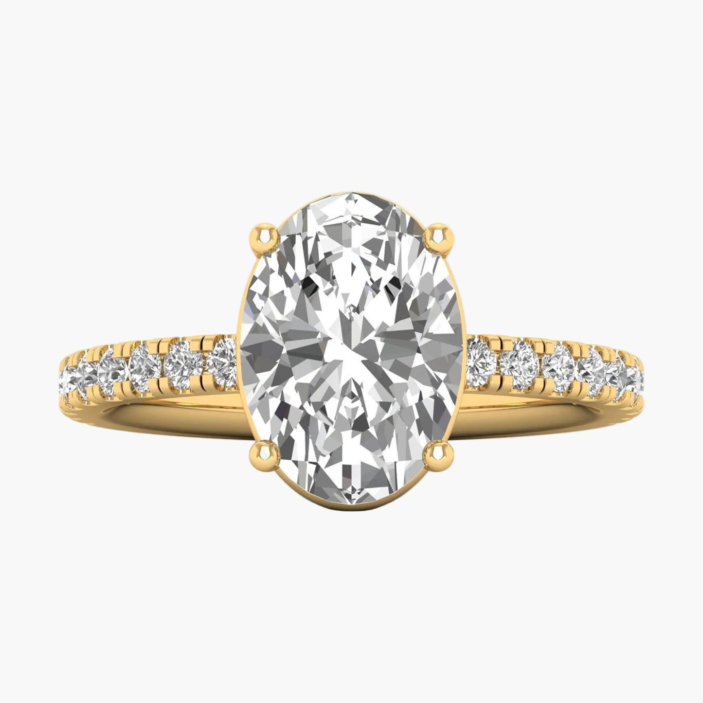 Gold ring with a large diamond and smaller diamonds on the band against a white background