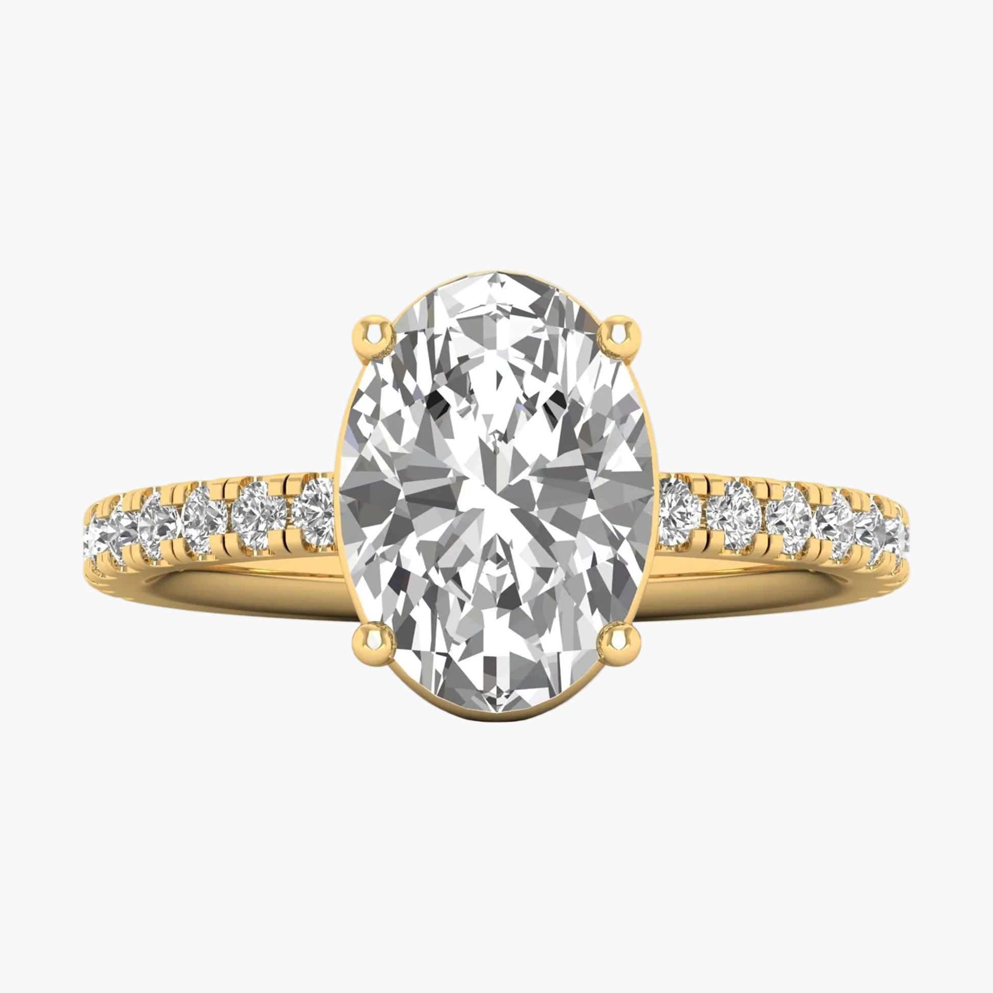 Gold ring with a large diamond and smaller diamonds on the band against a white background