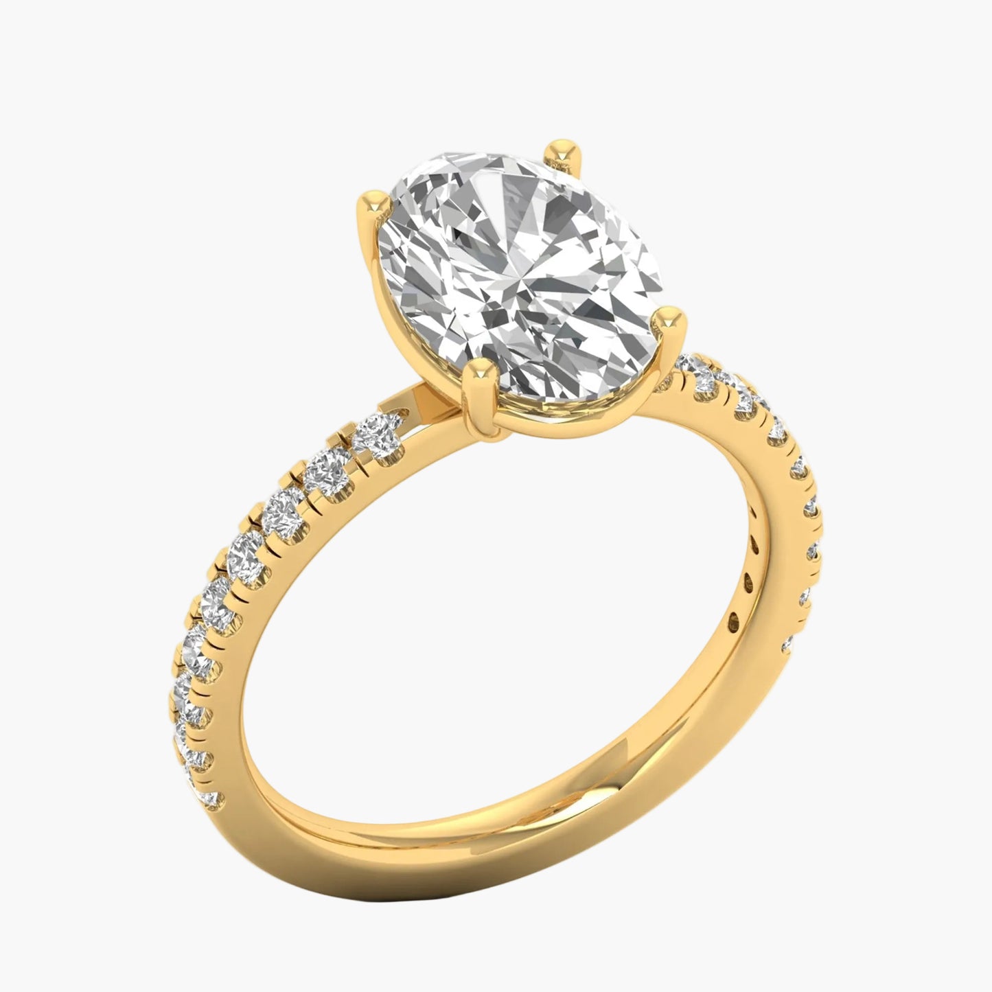 Gold ring with a large diamond and smaller diamonds on the band against a white background