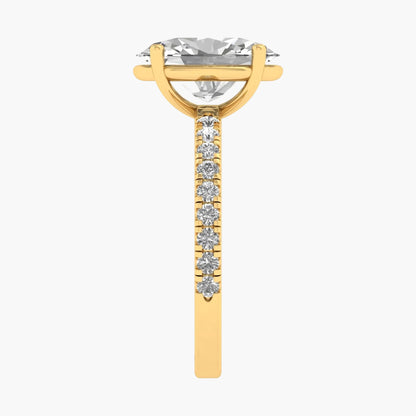 Gold earring with a central gemstone and smaller stones on a white background