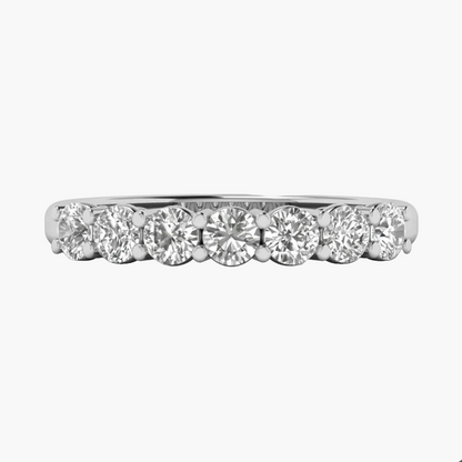 A five-stone diamond eternity ring in a silver-colored metal band, shown against a plain white background.