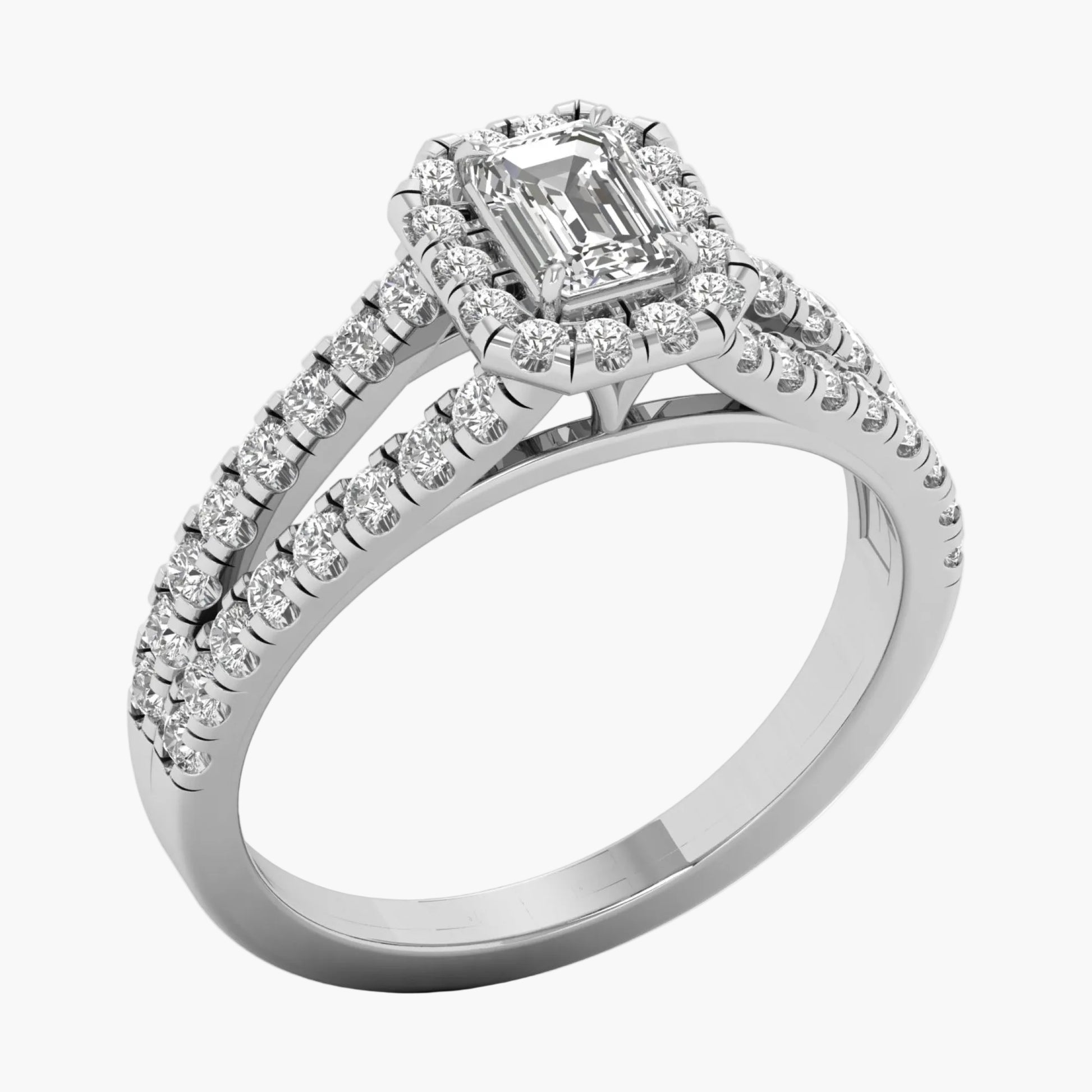 Diamond ring with a central gemstone and halo on a white background