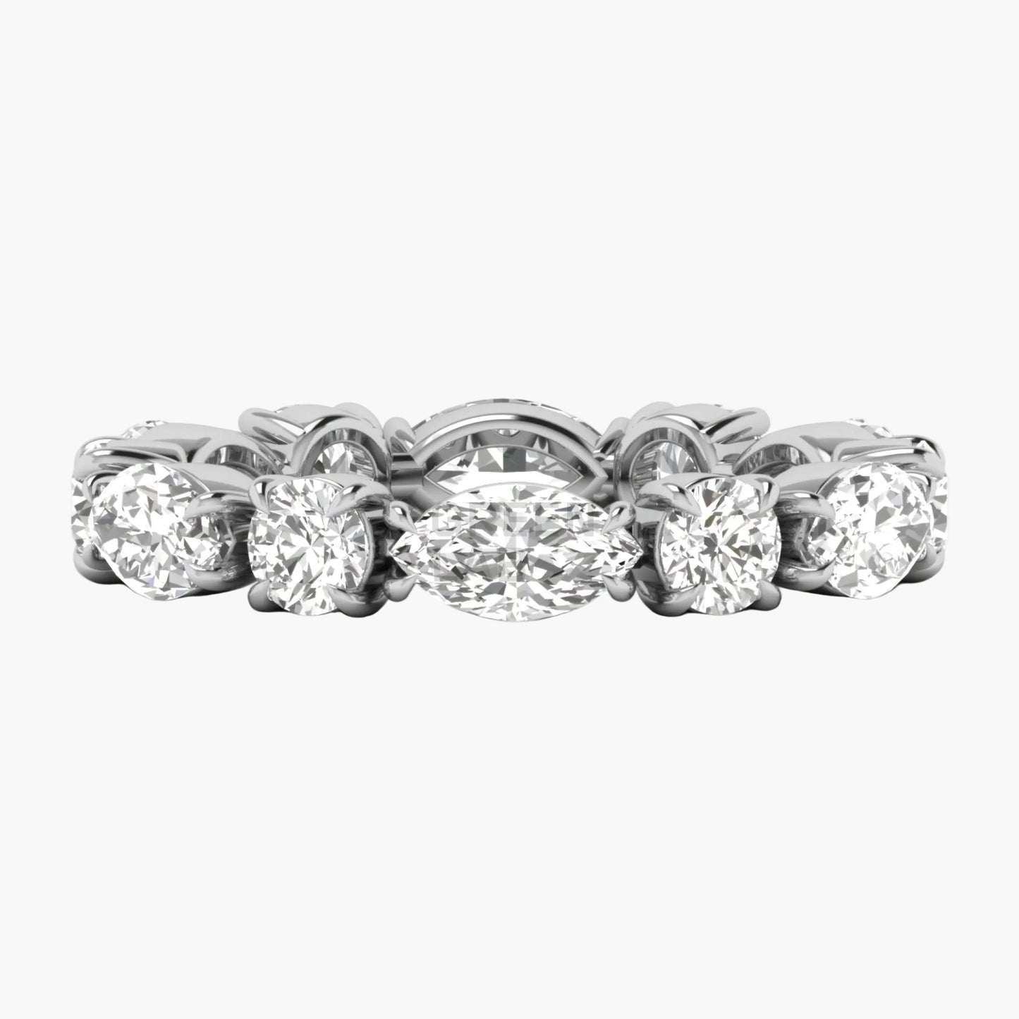 Diamond ring with multiple stones on a white background