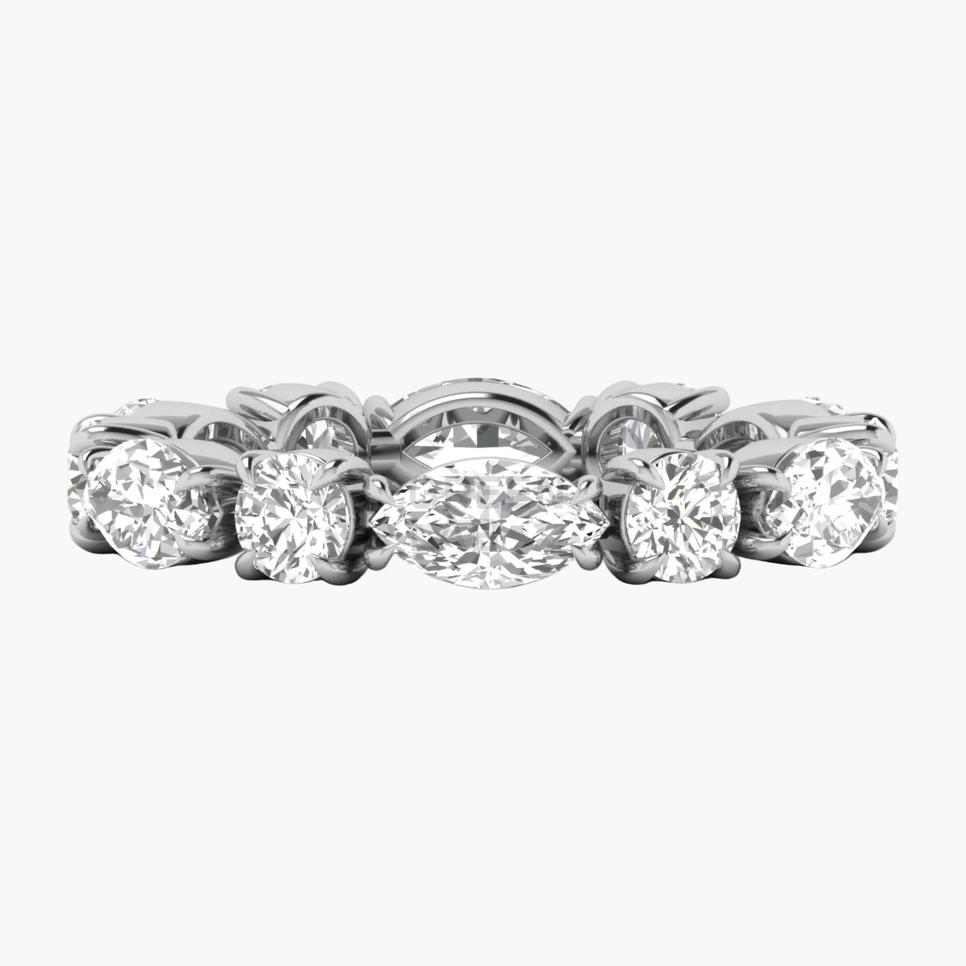 Diamond ring with multiple stones on a white background