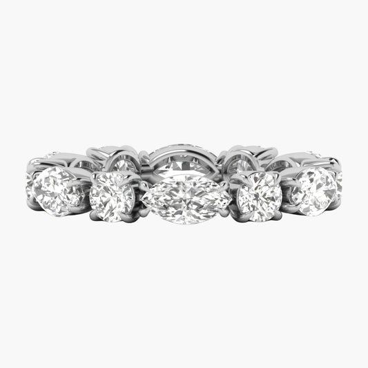 Diamond ring with multiple stones on a white background