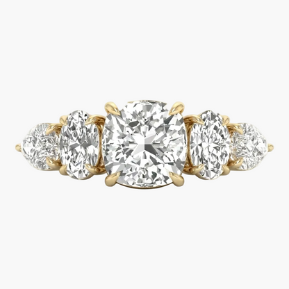 Gold ring with multiple diamonds on a white background