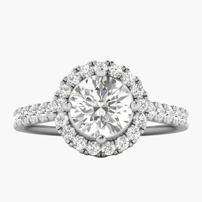 Diamond ring with a halo and additional stones on a white background