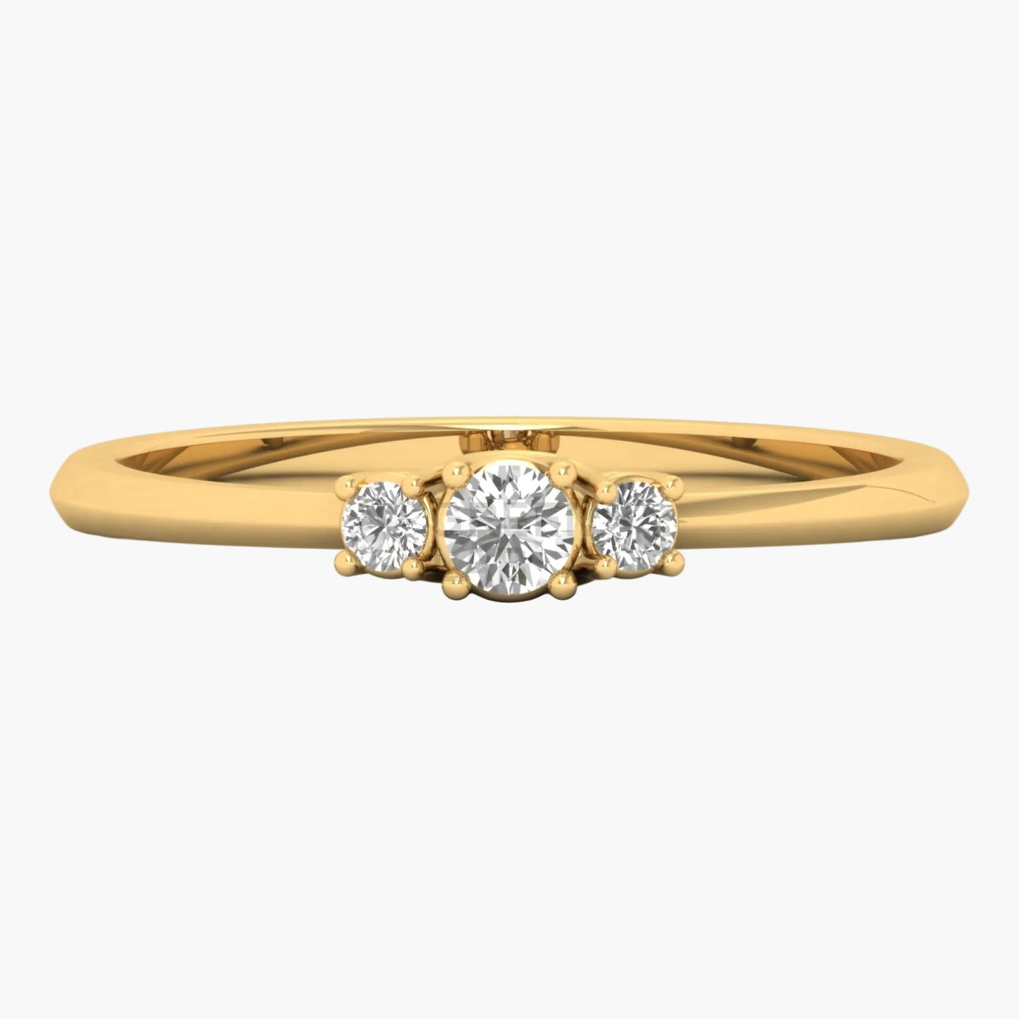 Gold ring with three diamonds on a white background