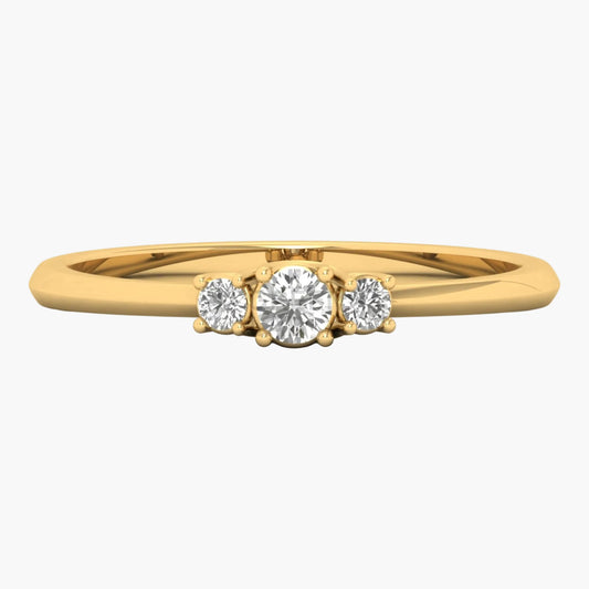 Gold ring with three diamonds on a white background