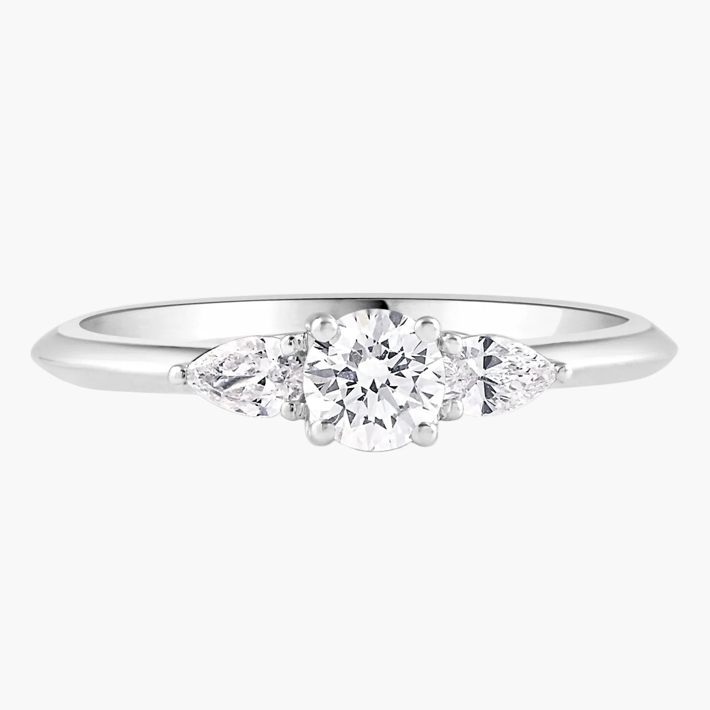 Diamond ring with three diamonds on a white background