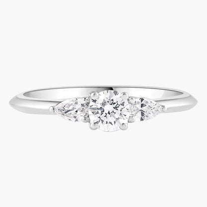 Diamond ring with three diamonds on a white background