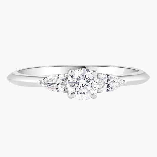 Diamond ring with three diamonds on a white background