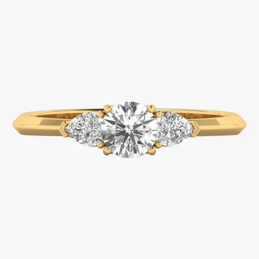 Gold ring with three diamonds on a white background