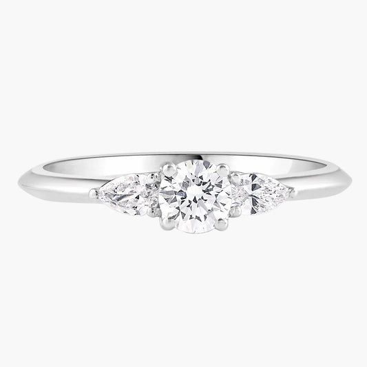 Diamond ring with three diamonds on a white background