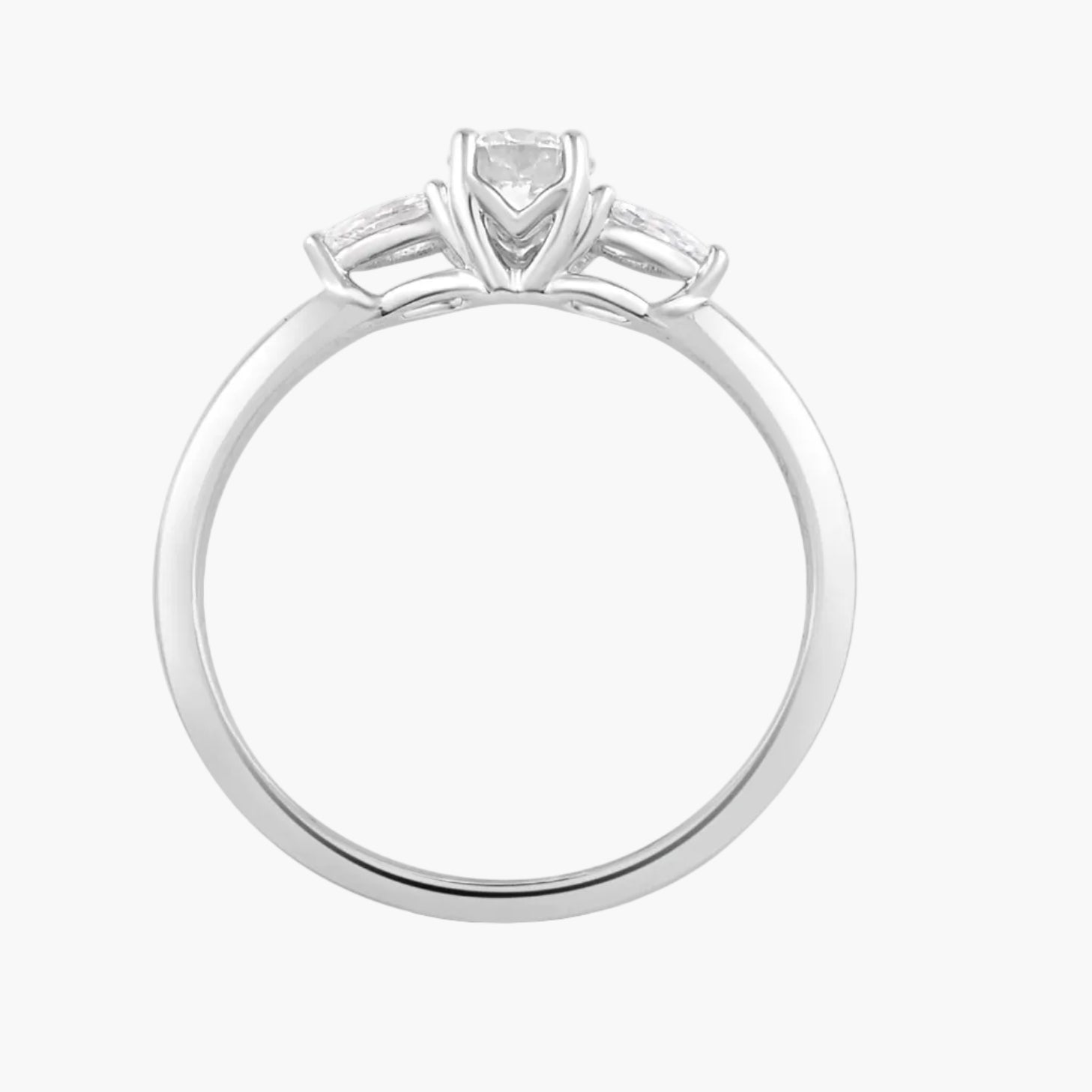 Diamond ring with a central diamond and two smaller diamonds on a white background