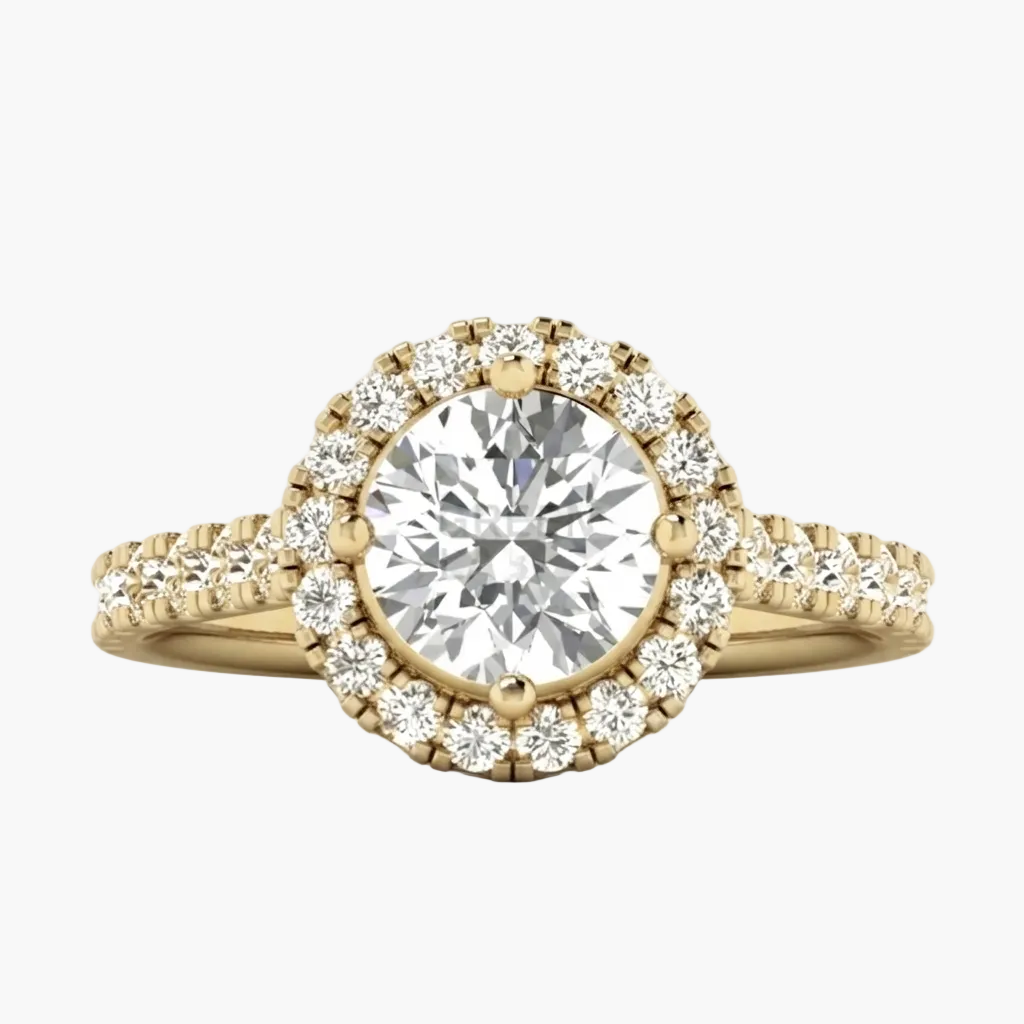 A yellow gold halo engagement ring featuring a round brilliant-cut center stone surrounded by a double halo of small pavé-set diamonds, with a split shank band also accented with diamonds, shown on a light gray background.
