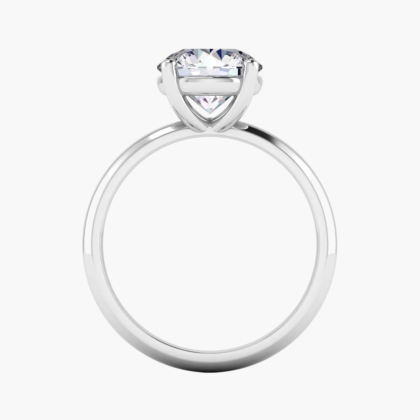 Silver ring with a clear gemstone on a white background