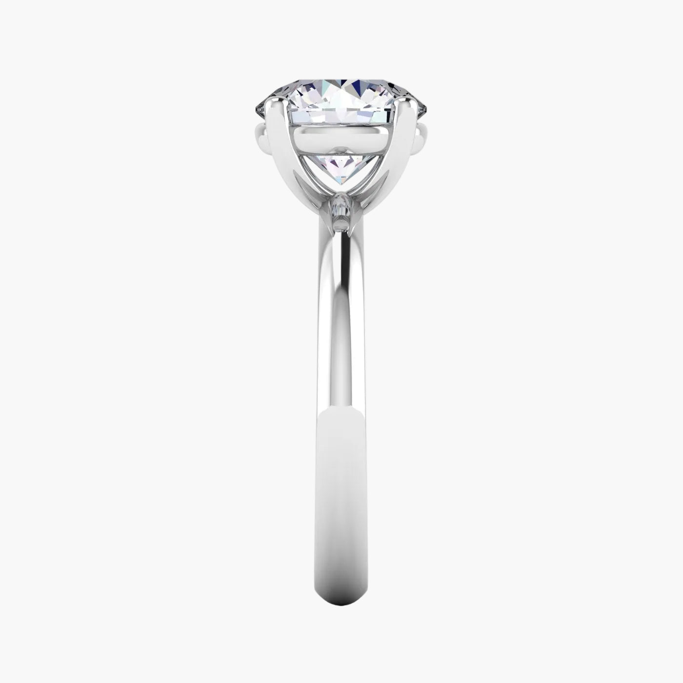 Silver ring with a clear gemstone on a white background