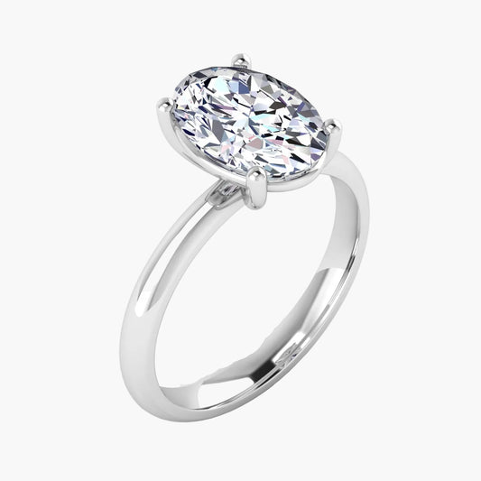 Silver ring with a large diamond on a white background