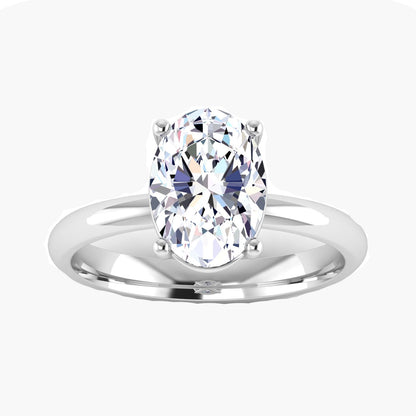 Silver ring with a large oval-shaped gemstone on a white background
