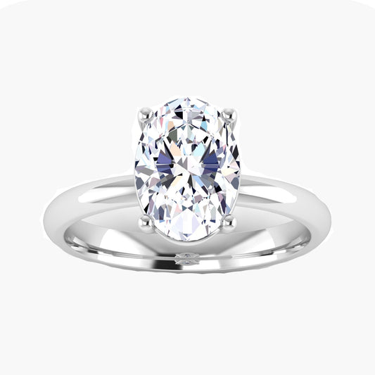 Silver ring with a large oval-shaped gemstone on a white background