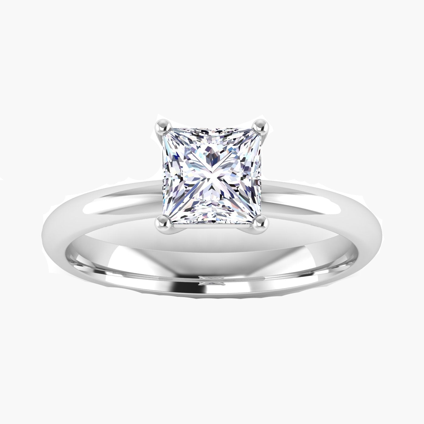 Silver ring with a princess-cut diamond on a white background