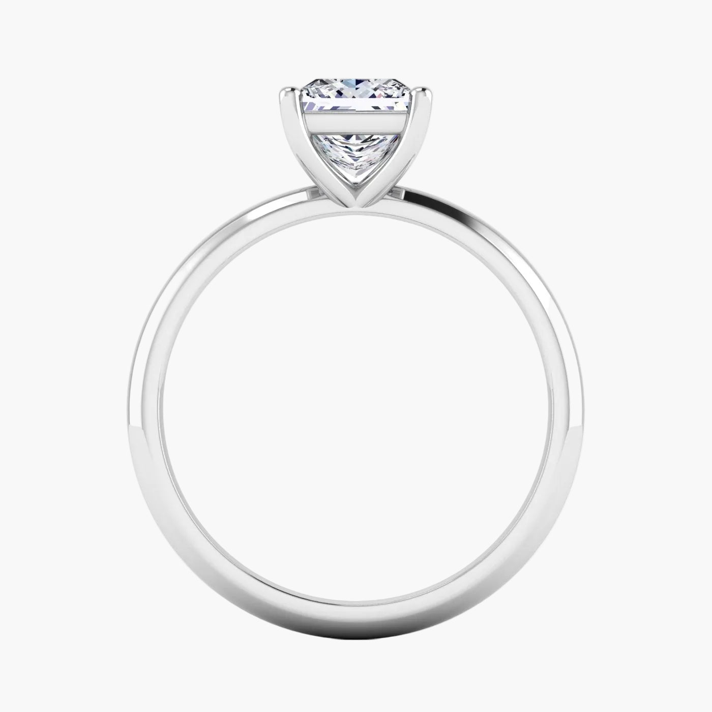 Silver ring with a heart-shaped diamond on a white background
