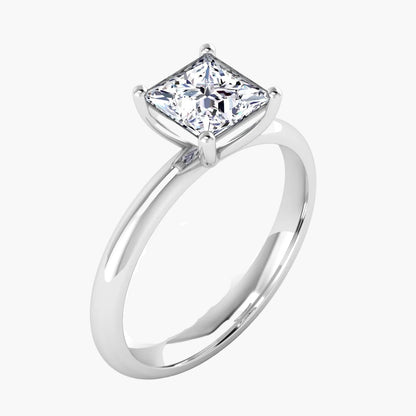 Silver ring with a large diamond on a white background