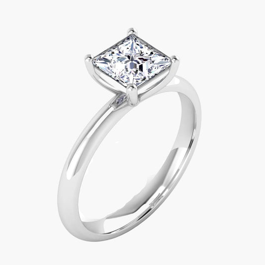 Silver ring with a large diamond on a white background