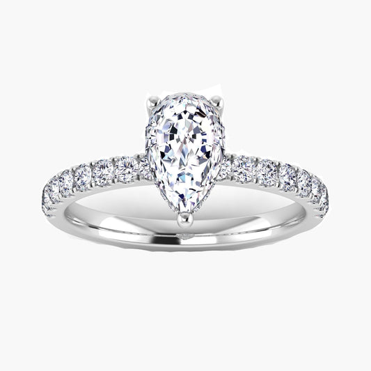 Diamond ring with a pear-shaped center stone on a white background