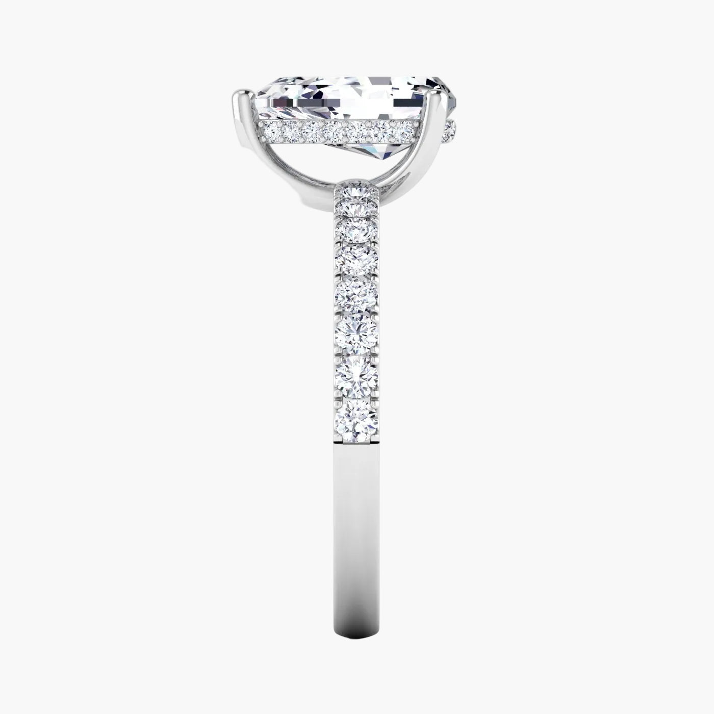 Diamond ring with a large center stone and smaller stones on the band against a white background