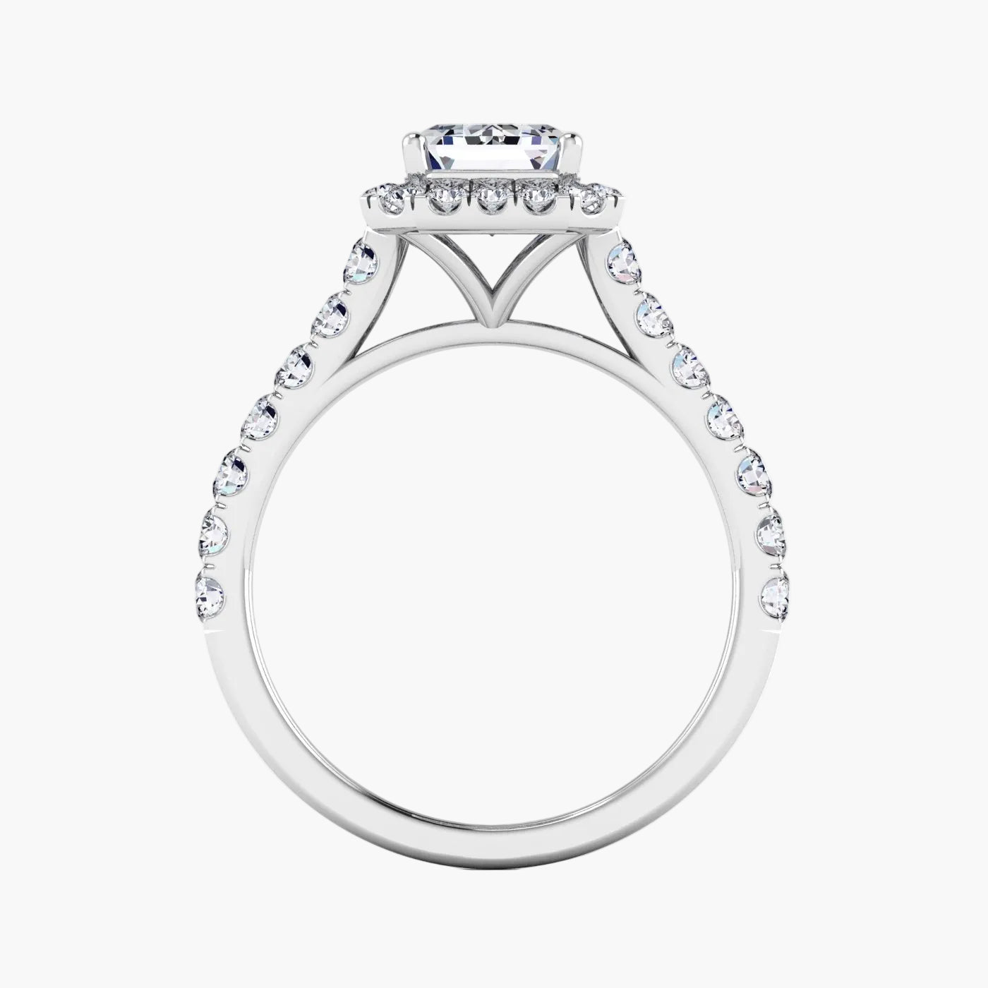 Silver ring with diamond accents on a white background
