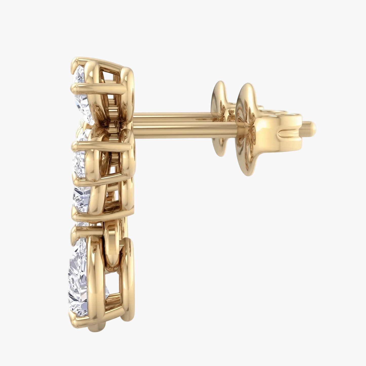 Gold earring with clear gemstones on a white background