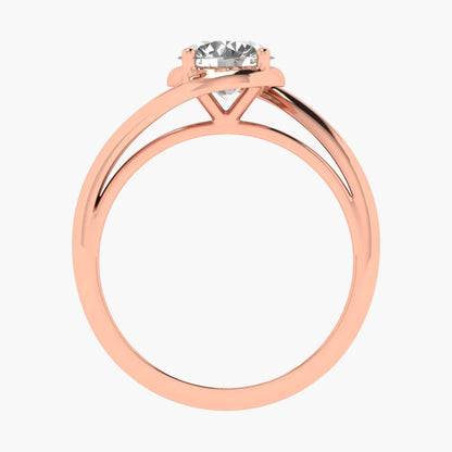 Rose gold ring with a diamond on a white background