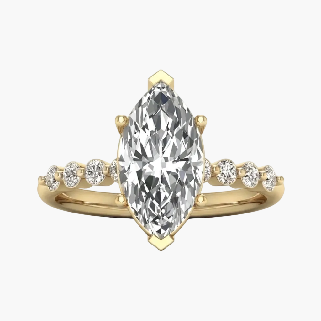 A yellow gold ring featuring a large marquise-cut diamond center stone with smaller round diamonds set along the shoulders, shown on a clean white background.