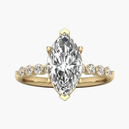 A yellow gold ring featuring a large marquise-cut diamond center stone with smaller round diamonds set along the shoulders, shown on a clean white background.