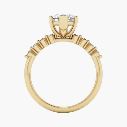 A yellow gold solitaire ring with a round-cut diamond center stone, shown from the back on a clean white background.
