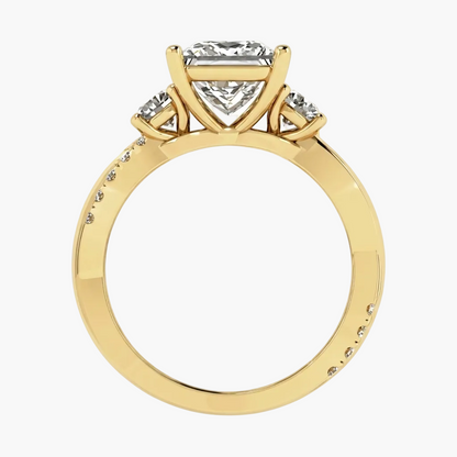 Gold ring with a heart-shaped diamond on a white background