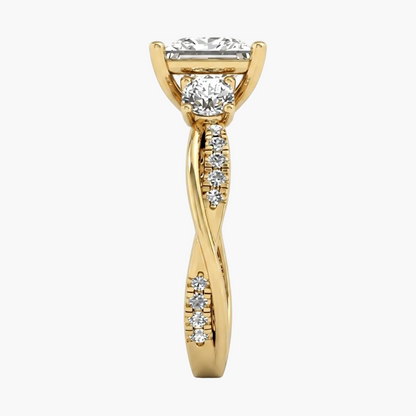 Gold ring with diamonds on a light gray background